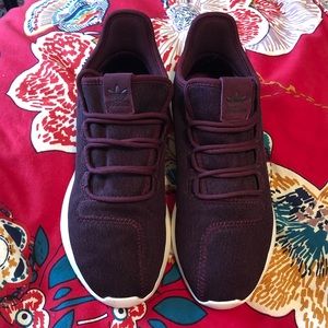 Burgundy adidas tubular sneakers